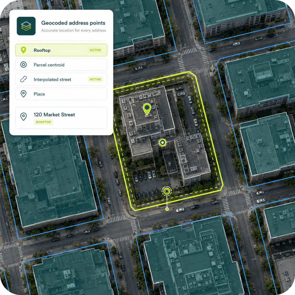 Aerial view of city blocks with a digital overlay showing geocoded address points, including 