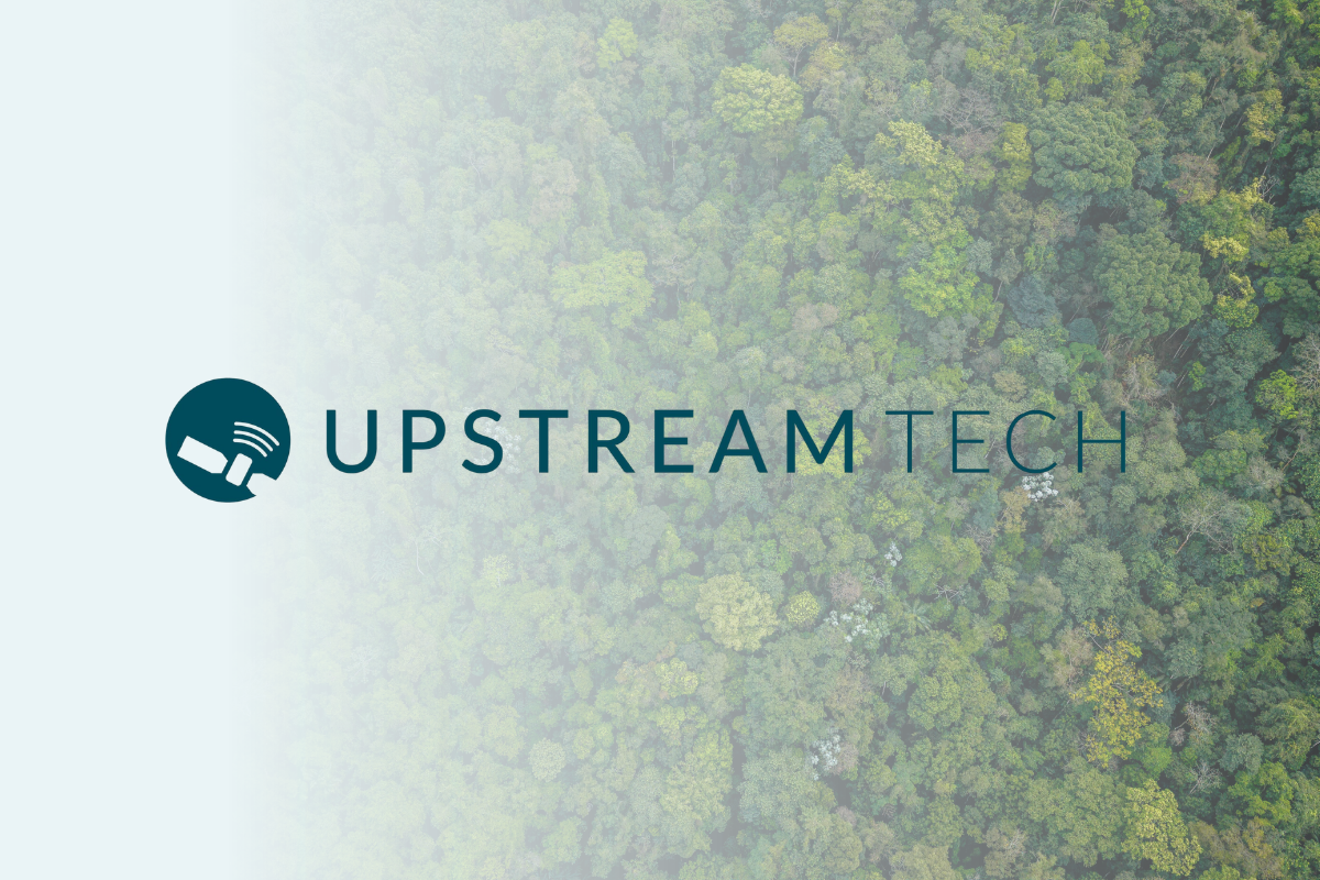 Forest aerial image overlaid with Upstream Tech logo