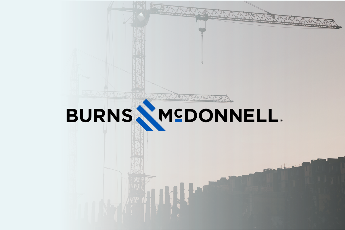 Cranes and building equipment with Burns & McDonnell logo over the top