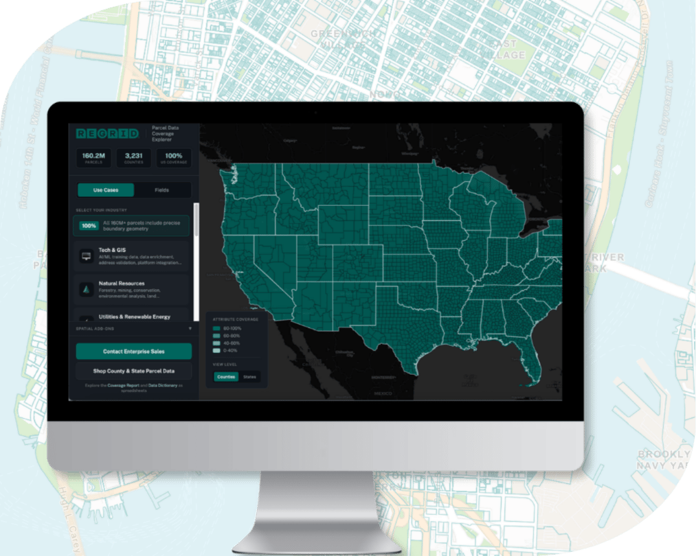 Regrid nationwide coverage explorer displayed on a computer screen overlaid on a parcel map of Manhattan