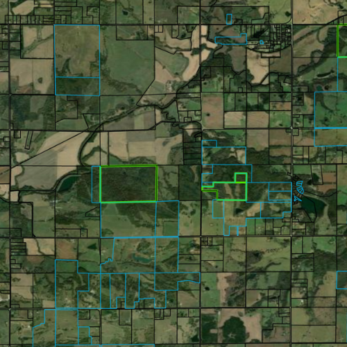 Aerial view of rural land parcels with some highlighted