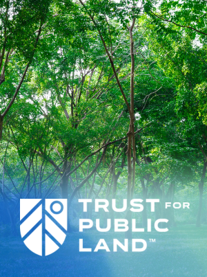 Trust for public land logo overlaid over a picture of trees