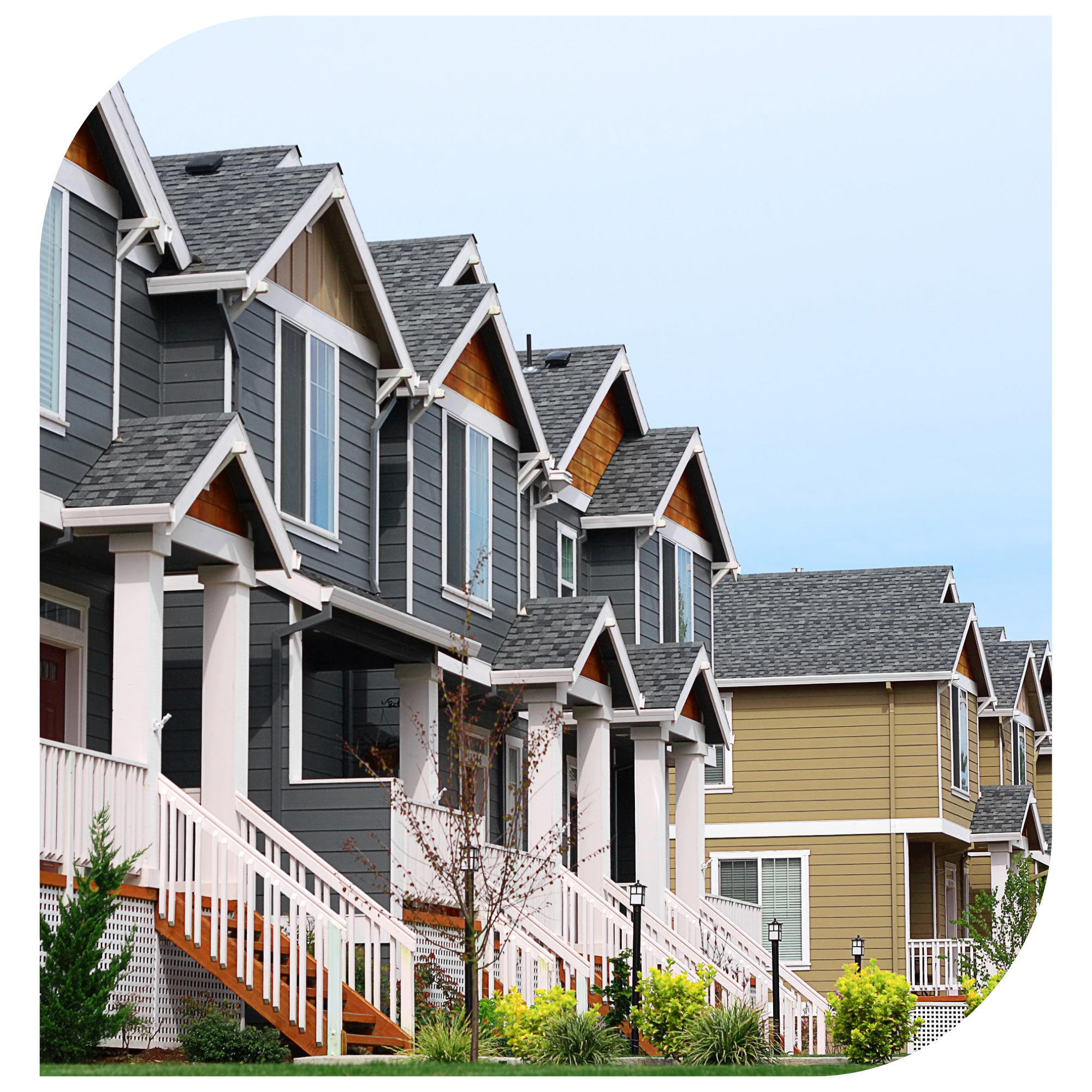 Image of a row of houses along a street Image of a row of houses along a street